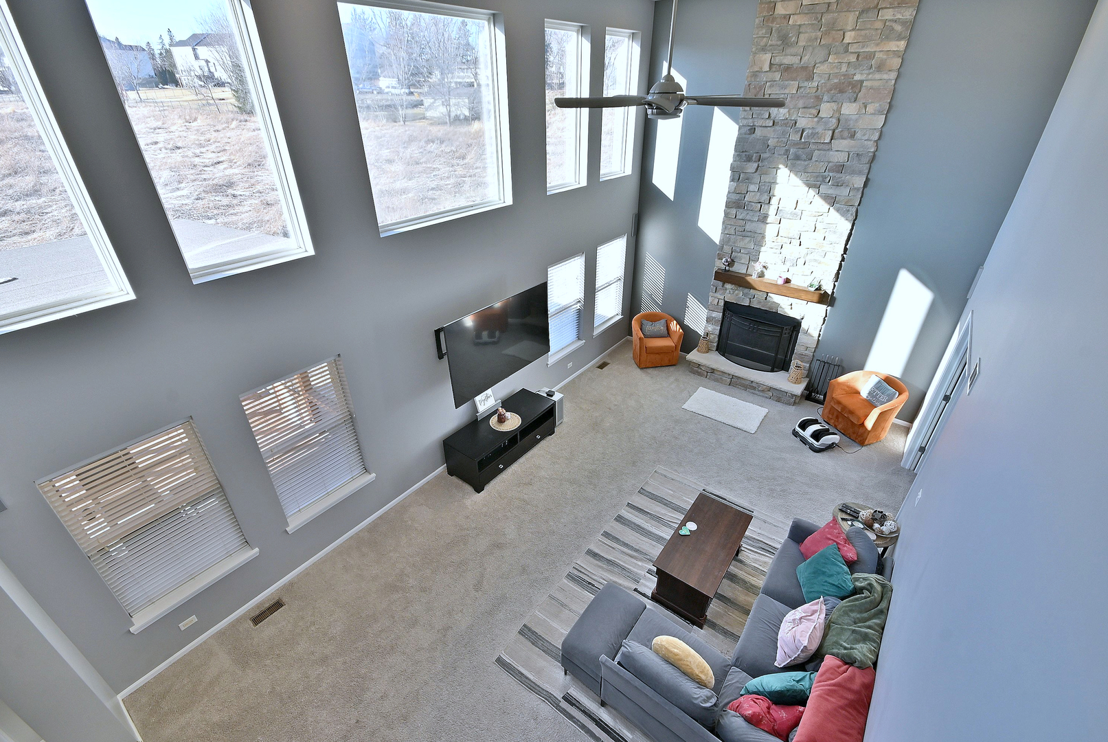 579 Homestead Court Aurora, IL 60506 - Photo 28 of 45 a living room with furniture and a couch