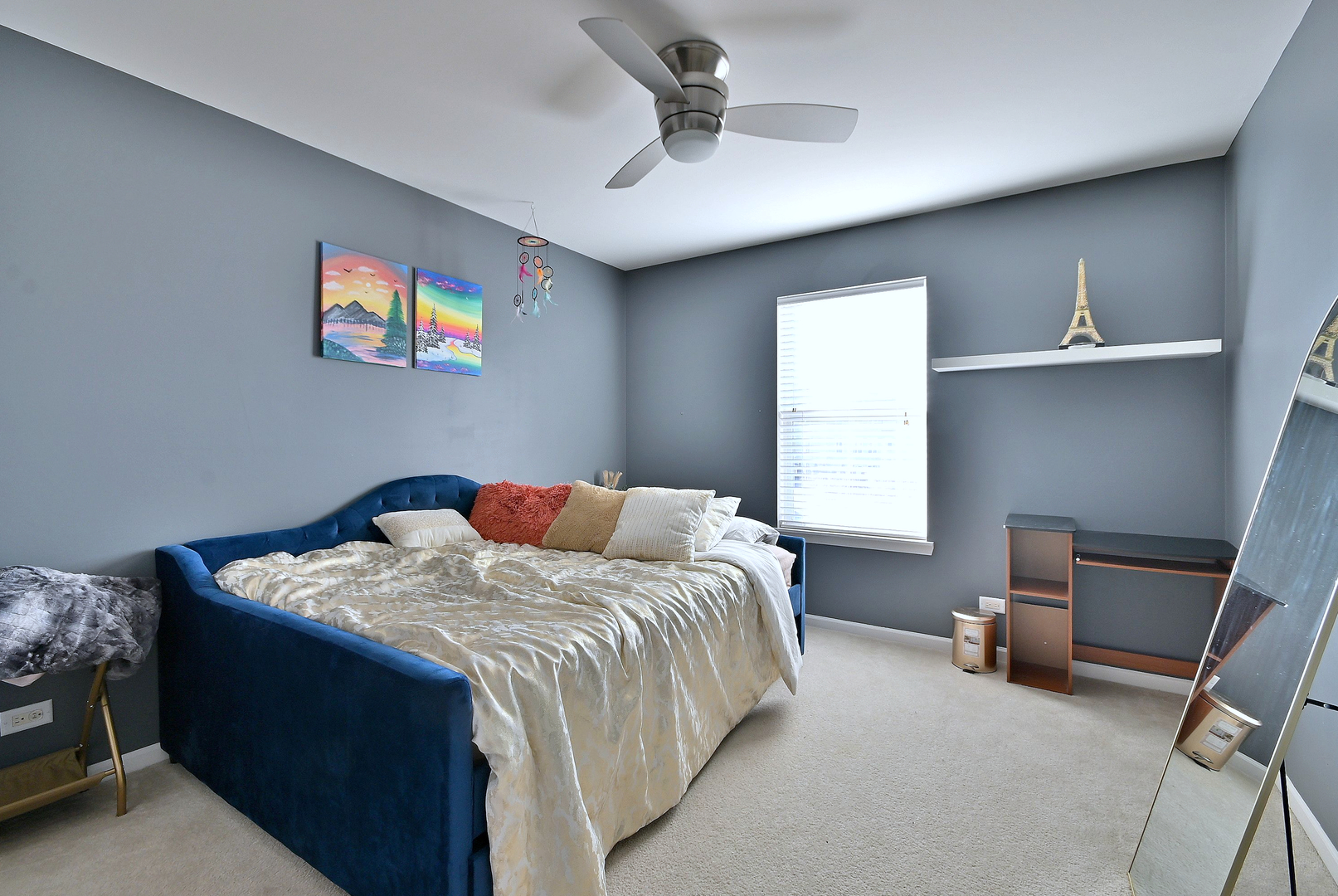 579 Homestead Court Aurora, IL 60506 - Photo 30 of 45 a bed sitting in a bedroom next to a window