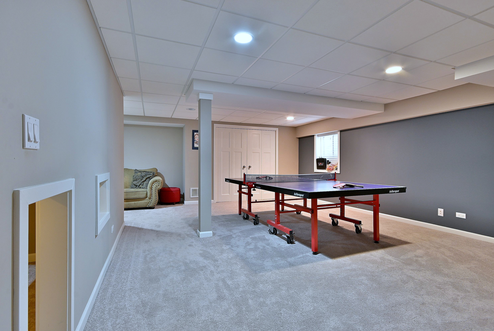 579 Homestead Court Aurora, IL 60506 - Photo 43 of 45 a living room with furniture and a table