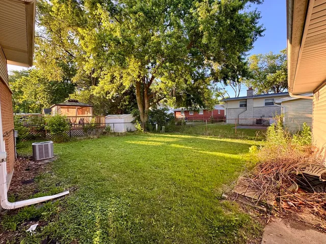 a view of a house with a big yard