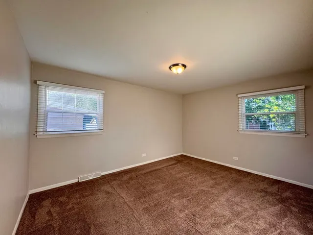 a view of a bedroom with a window