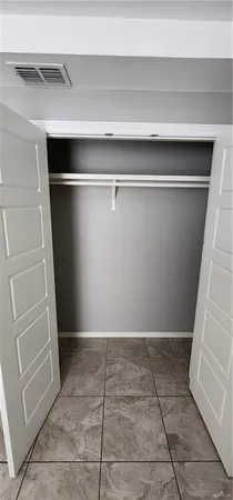 a view of a room with white door