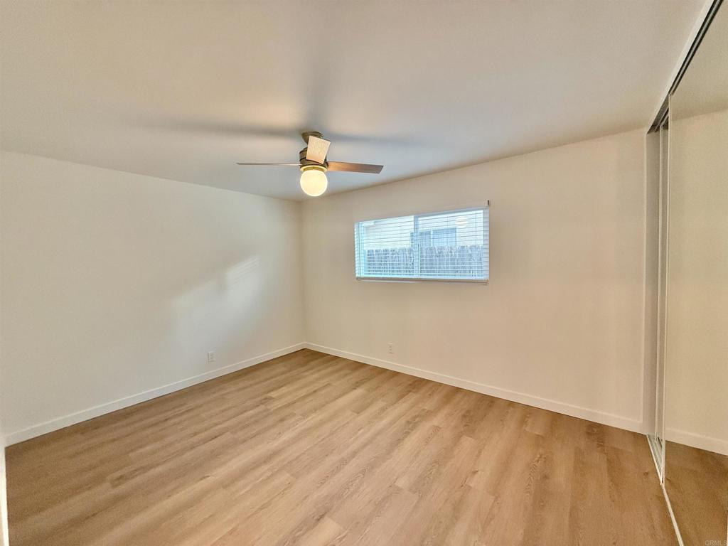 10296 Baroness Avenue San Diego, CA 92126 - Photo 20 of 27 wooden floor in a empty room