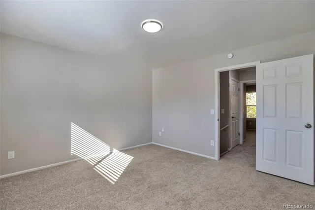 a bathroom with a sink toilet and mirror