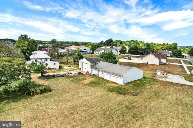 a view of a swimming pool with lounge chair