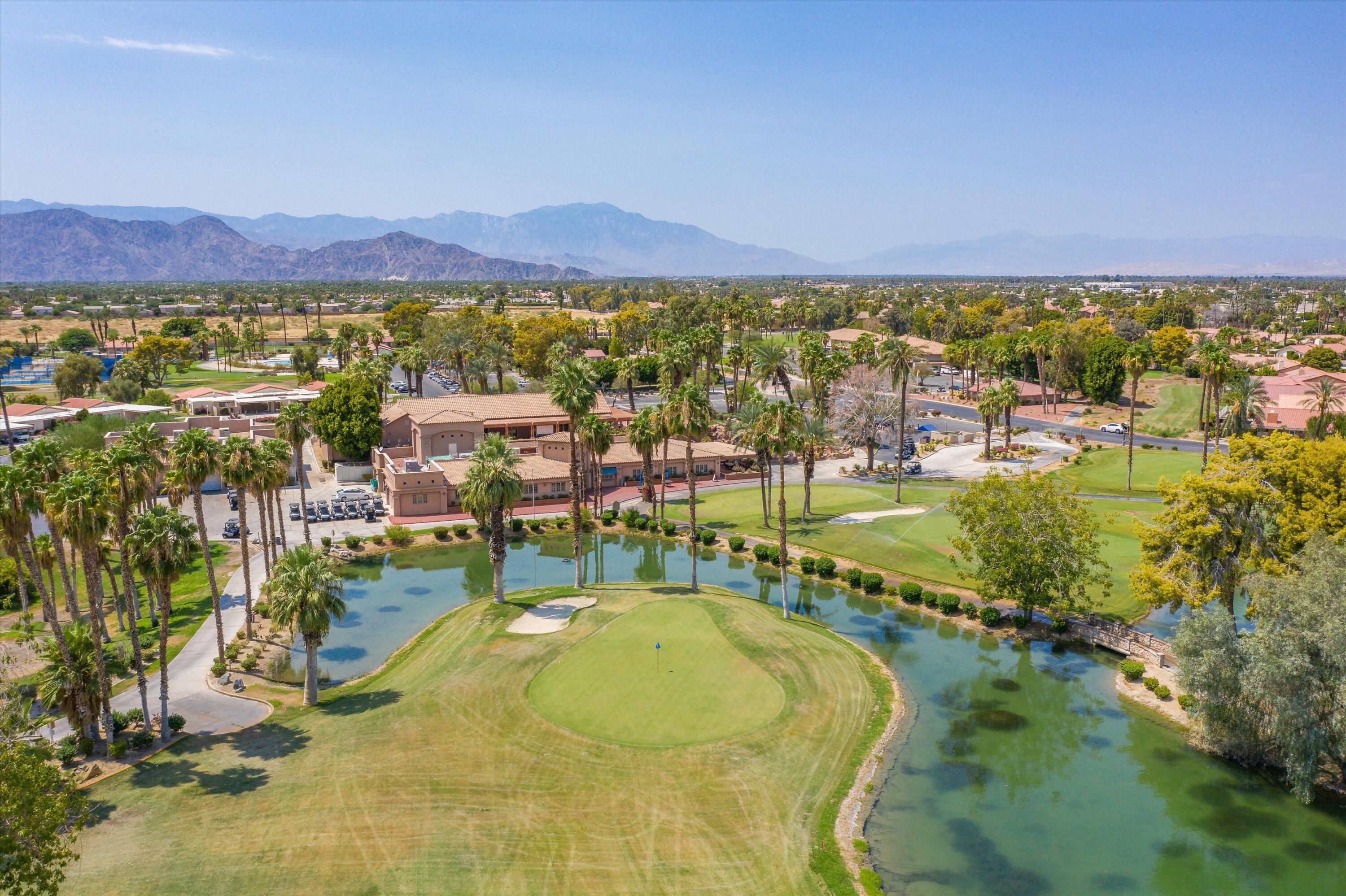 49465 Lewis Road Indio, CA 92201 - Photo 2 of 31 a view of residential houses with outdoor space swimming pool