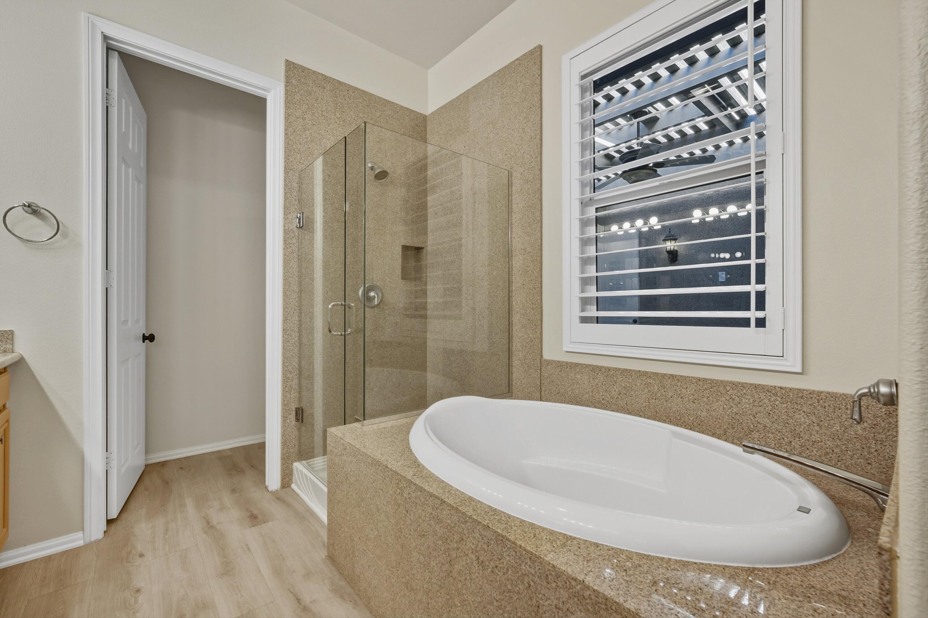 49465 Lewis Road Indio, CA 92201 - Photo 23 of 31 a bathroom with a sink a toilet and shower