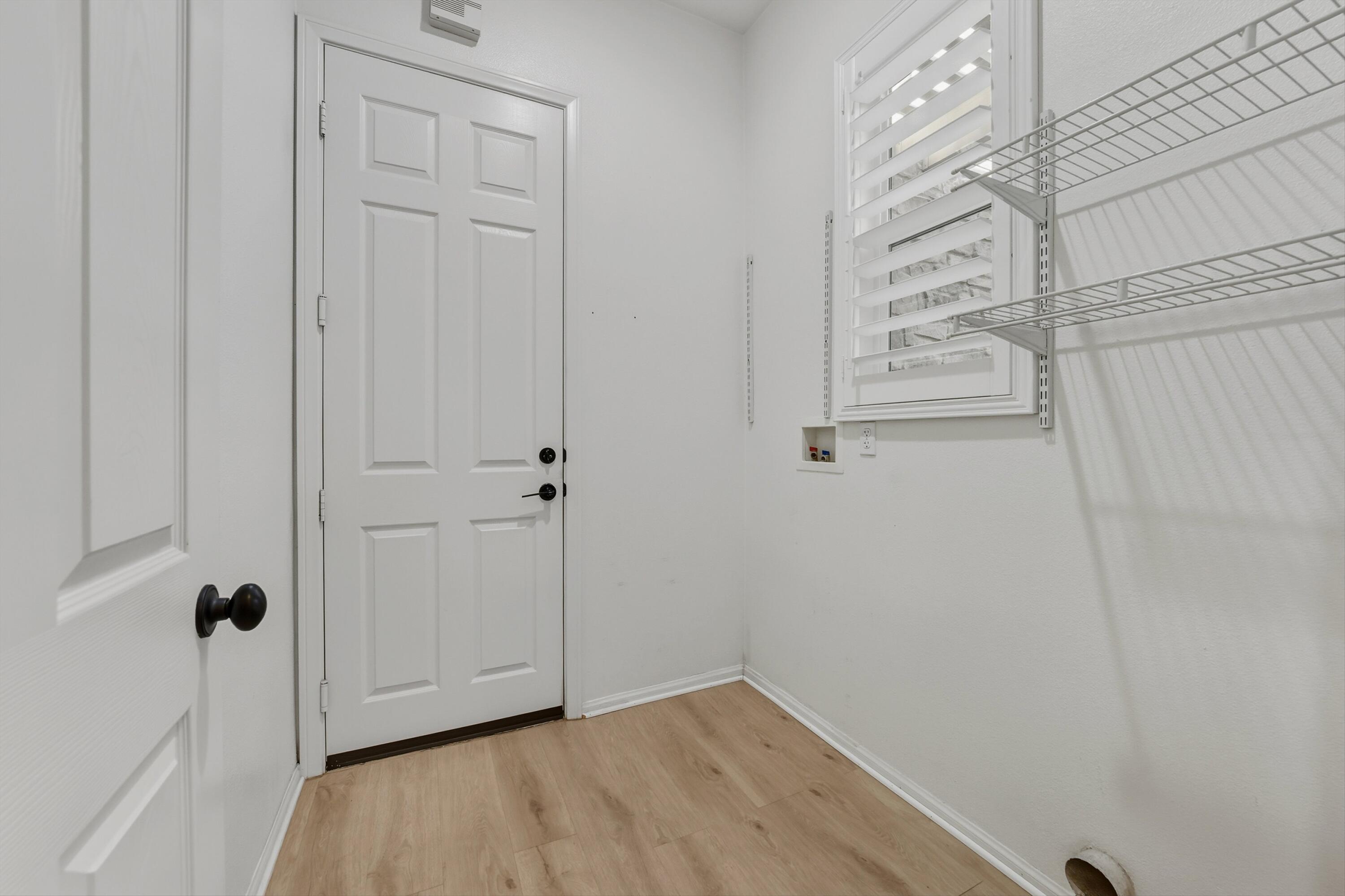 49465 Lewis Road Indio, CA 92201 - Photo 26 of 31 a view of empty room with wooden floor