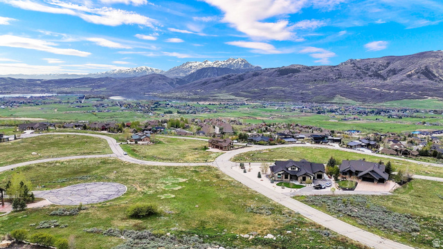 3722 Porcupine Ridge Drive, Unit 105 Eden, UT 84310 - Photo 9 of 22 Aerial view of residential area featuring a mountain backdrop