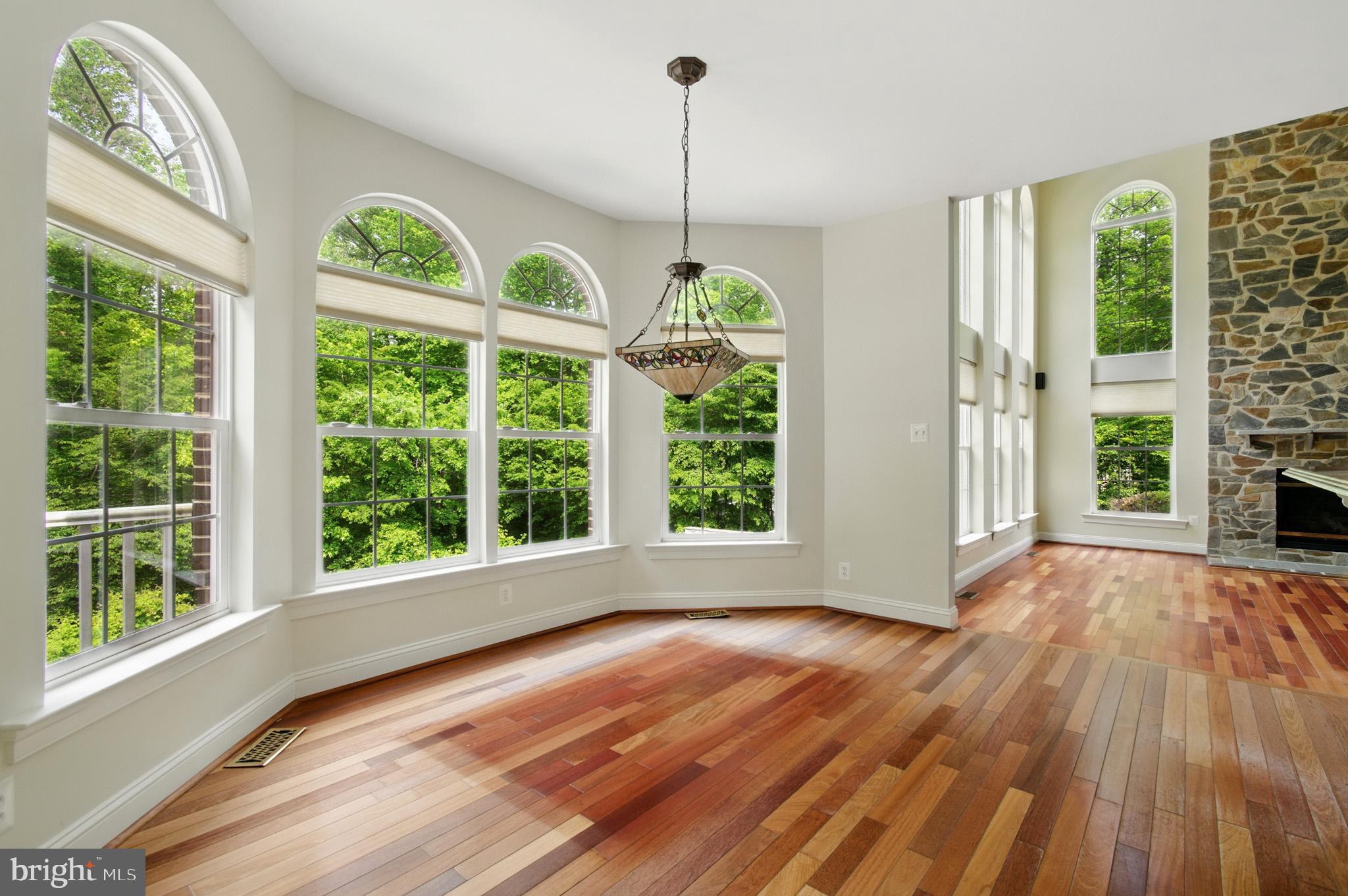 1002 Covington Way Annapolis, MD 21401 - Photo 24 of 78 a view of an empty room with wooden floor and a window
