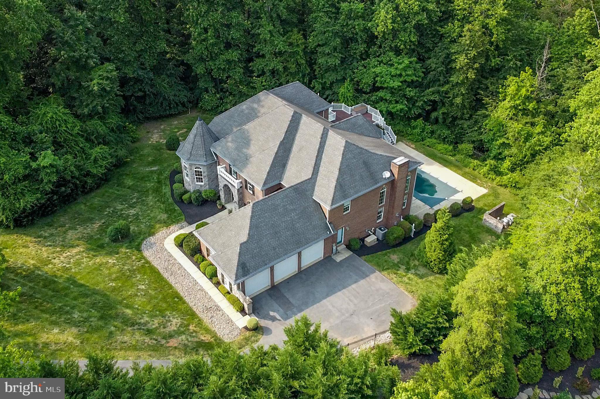1002 Covington Way Annapolis, MD 21401 - Photo 3 of 78 an aerial view of a house with a yard and trees