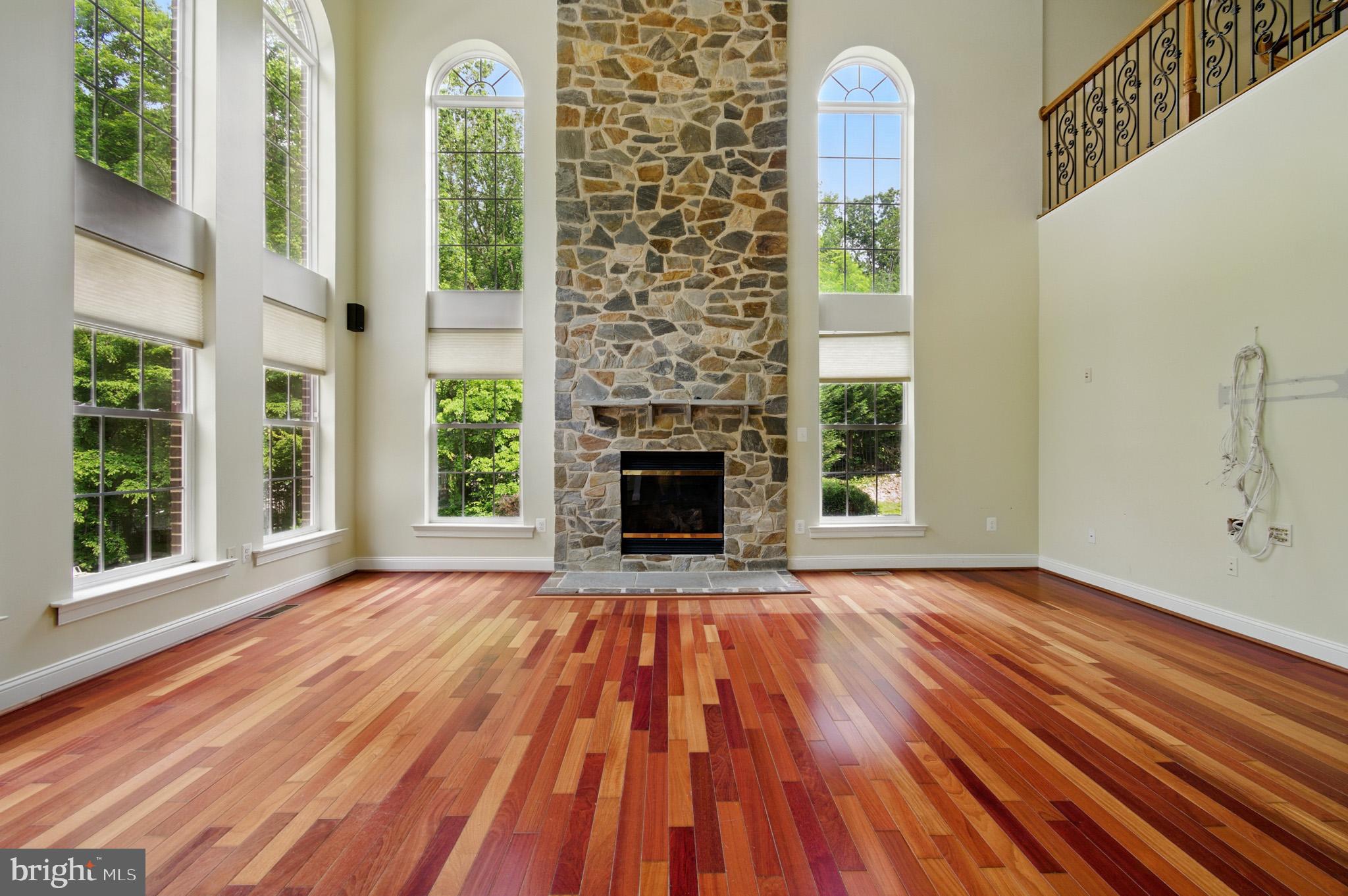 1002 Covington Way Annapolis, MD 21401 - Photo 31 of 78 a view of an empty room with a window and wooden floor
