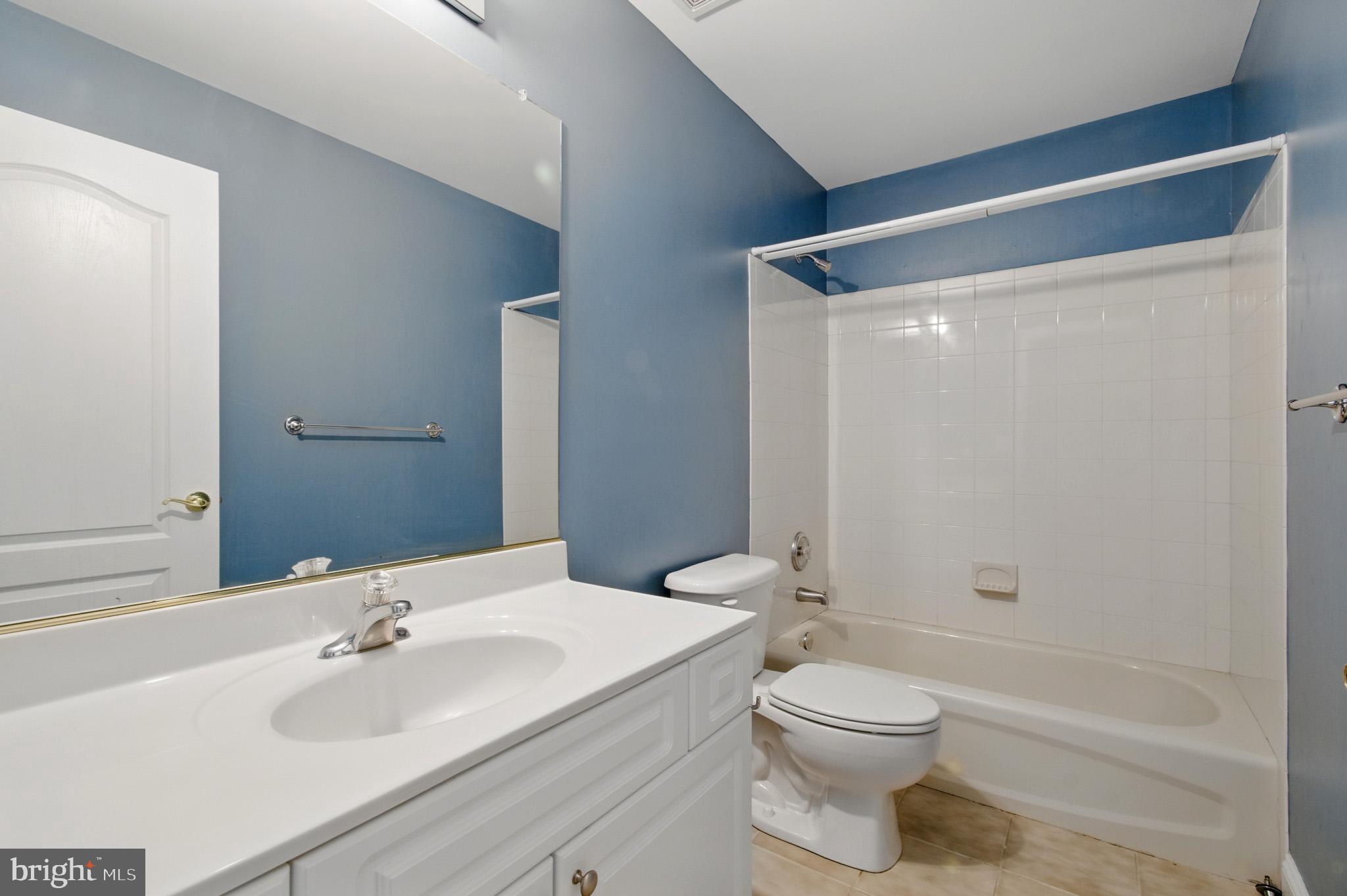 1002 Covington Way Annapolis, MD 21401 - Photo 38 of 78 a bathroom with a sink a toilet and shower