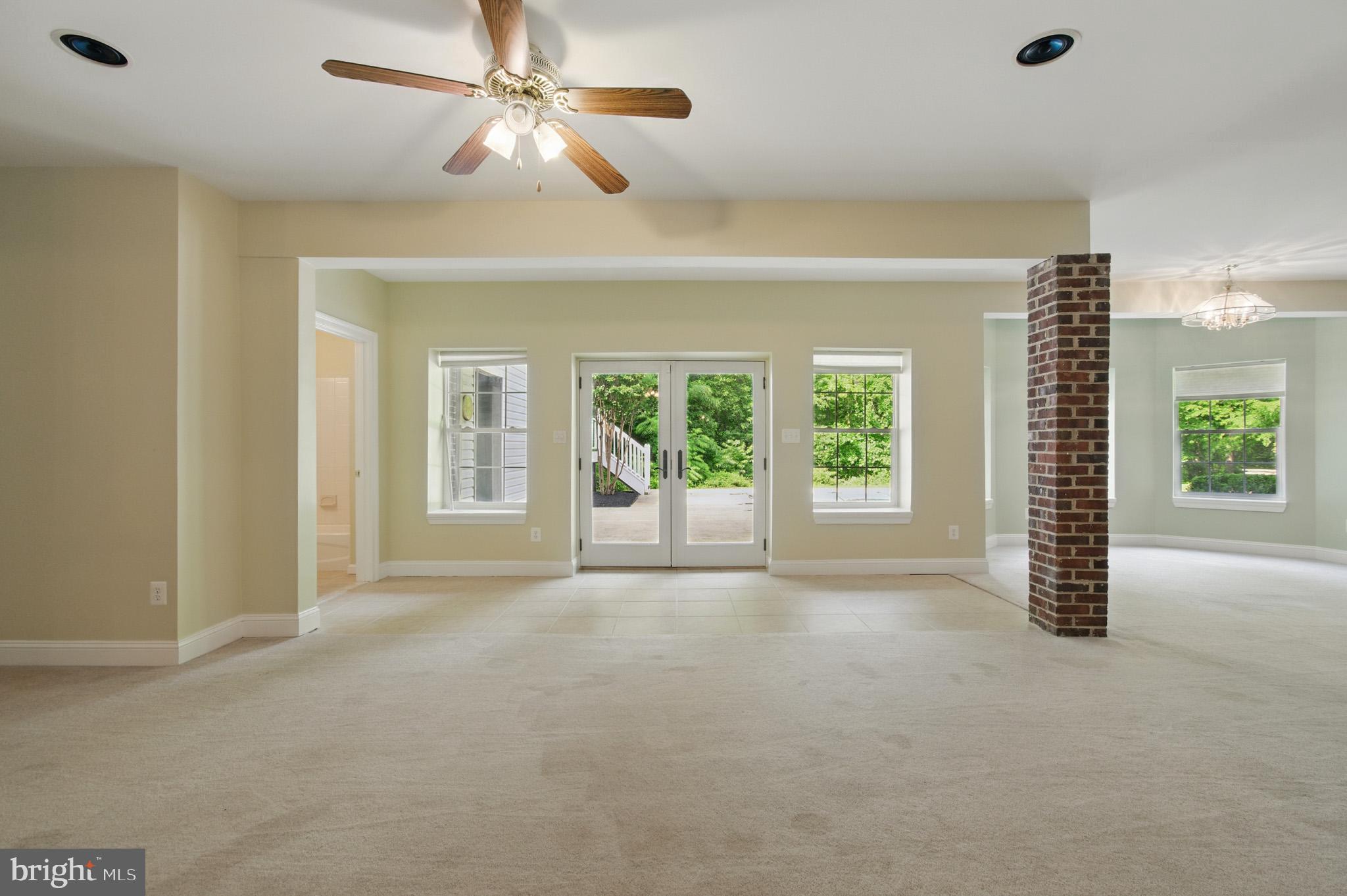1002 Covington Way Annapolis, MD 21401 - Photo 57 of 78 a view of a room with windows and chandelier fan