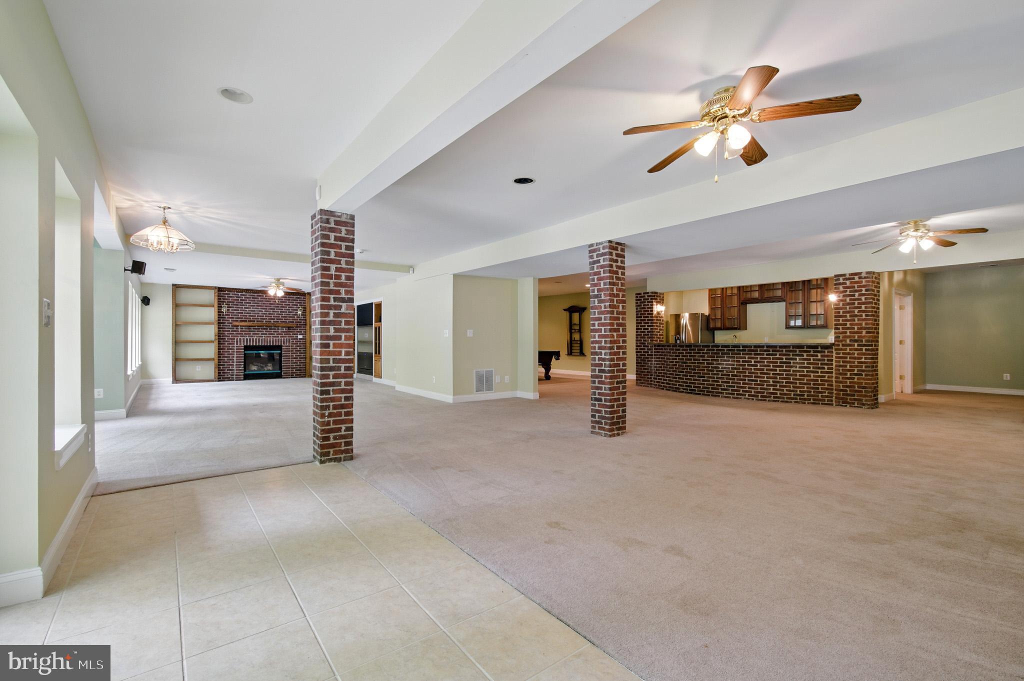 1002 Covington Way Annapolis, MD 21401 - Photo 58 of 78 a view of a livingroom with furniture a ceiling fan and window