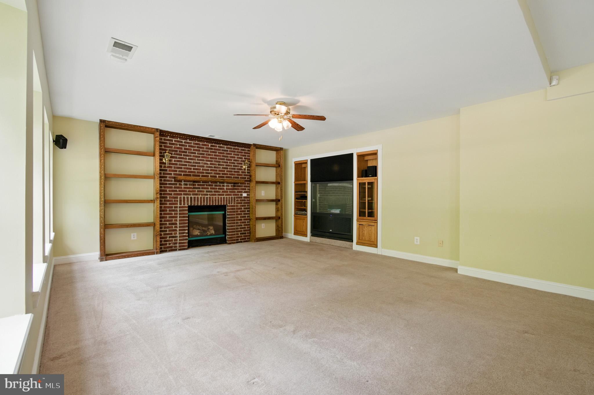 1002 Covington Way Annapolis, MD 21401 - Photo 62 of 78 a view of an empty room with a fireplace