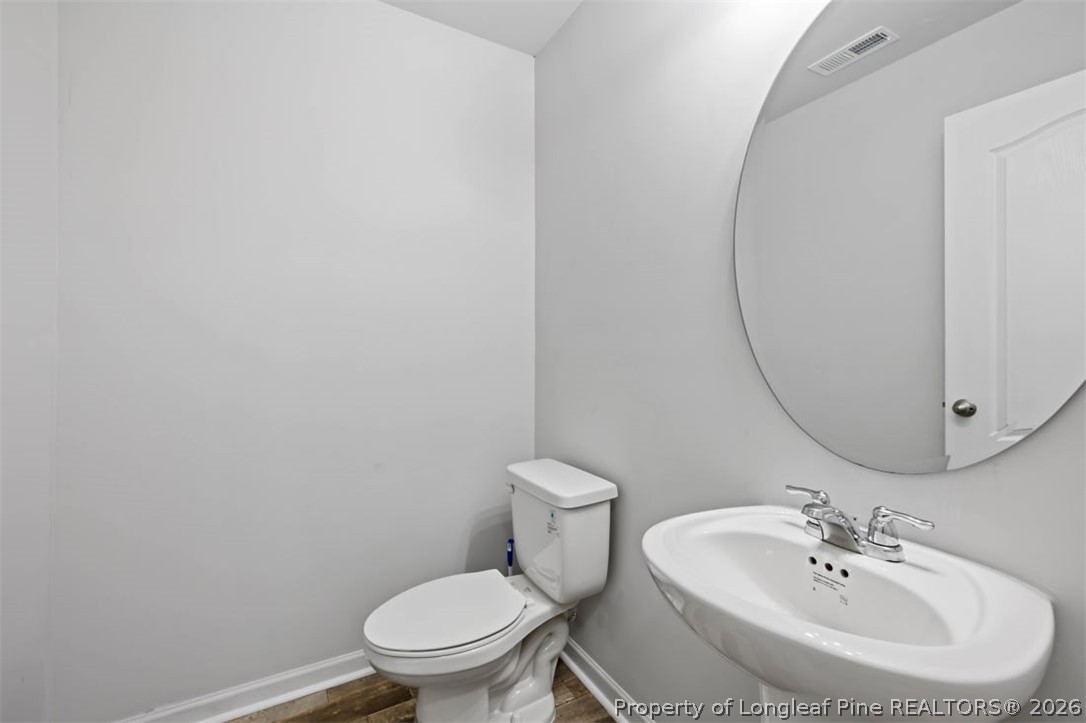100 Merlin Court Godwin, NC 28344 - Photo 8 of 50 Downstairs Half Bathroom
