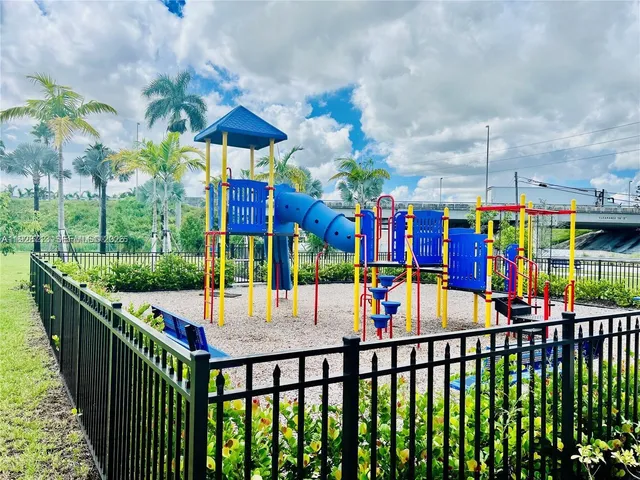 a view of a swimming pool with a porch