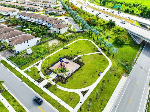 a view of swimming pool from a balcony