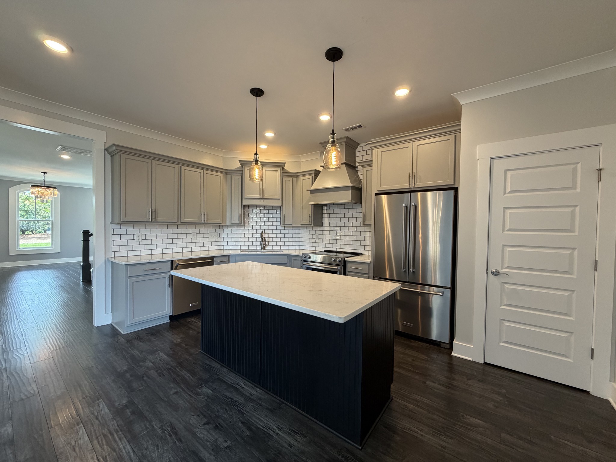 3097 Rural Plains Circle Franklin, TN 37064 - Photo 2 of 28 a large kitchen with stainless steel appliances kitchen island a large counter top and sink