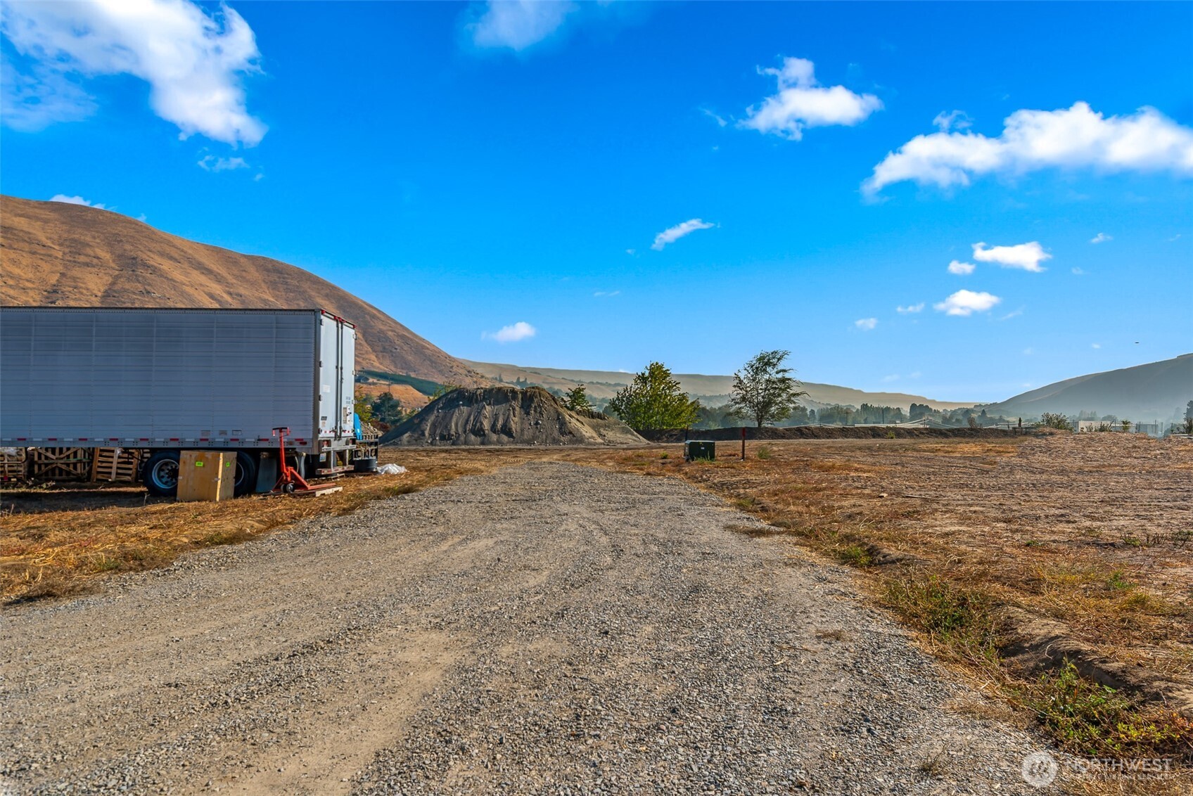 4000 Pioneer Way Monitor, WA 98836 - Photo 9 of 13 a view of a house with a yard