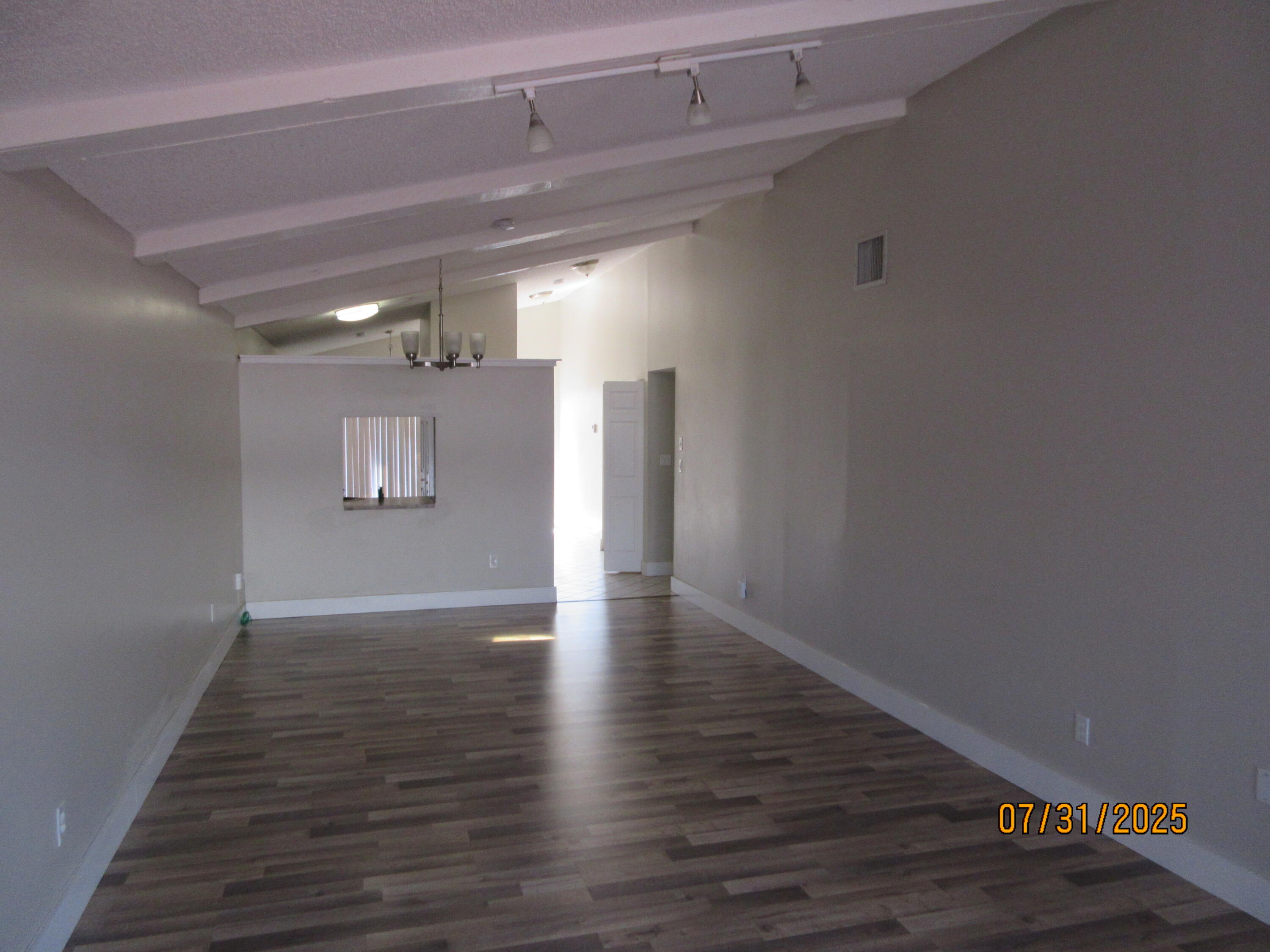 1760 Northwest 72nd Avenue, Unit 81 Plantation, FL 33313 - Photo 3 of 10 a view of empty room with wooden floor