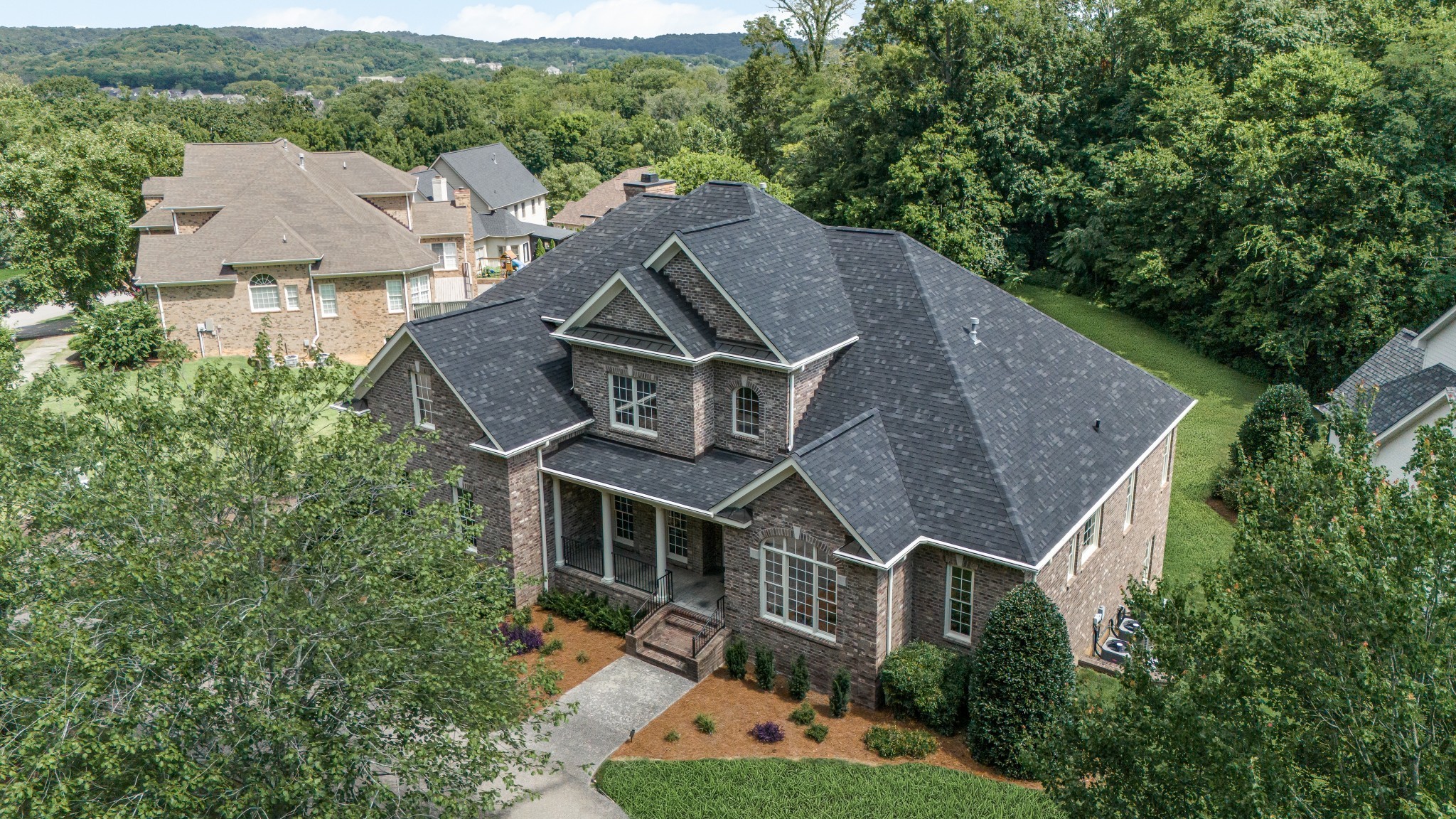 424 Sandcastle Road Franklin, TN 37069 - Photo 2 of 62 an aerial view of a house with a big yard plants and large trees