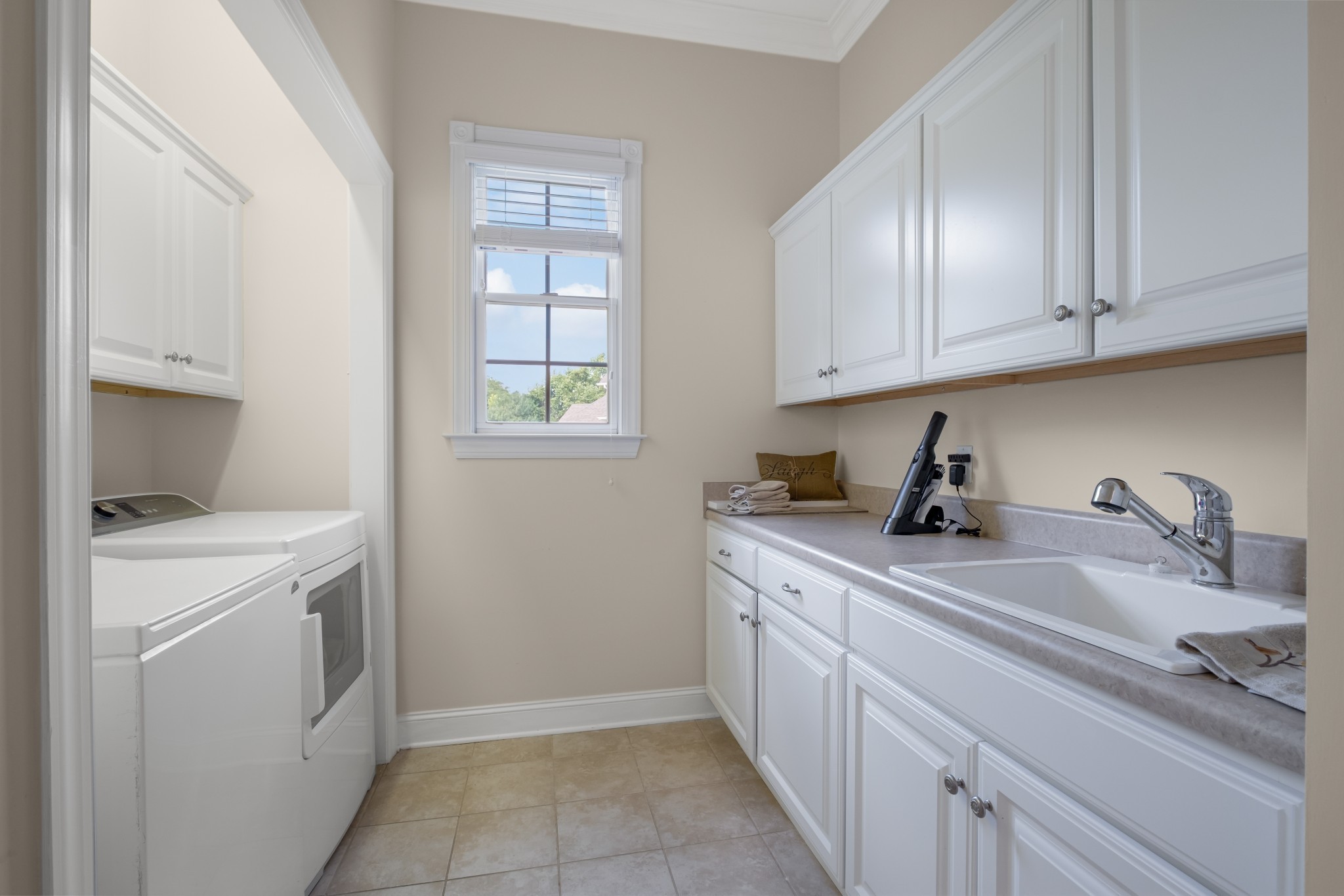 424 Sandcastle Road Franklin, TN 37069 - Photo 35 of 62 a kitchen with stainless steel appliances granite countertop a sink stove and cabinets