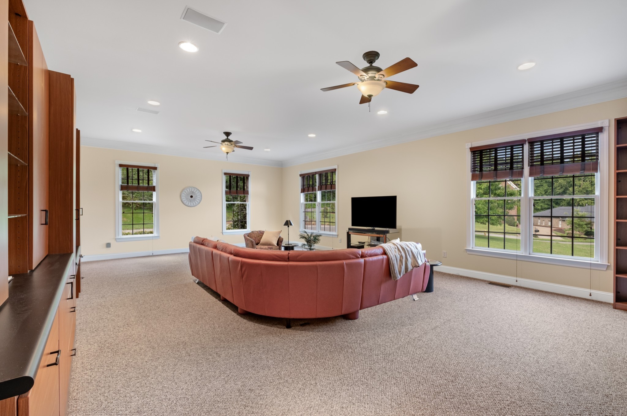 424 Sandcastle Road Franklin, TN 37069 - Photo 36 of 62 a living room with furniture and a flat screen tv