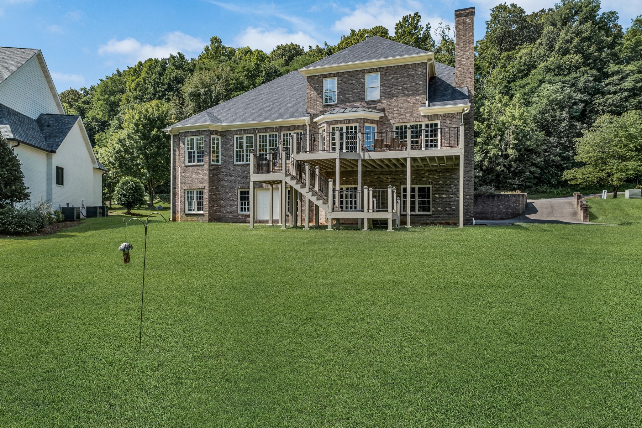 424 Sandcastle Road Franklin, TN 37069 - Photo 59 of 62 a view of a house with a yard and sitting area