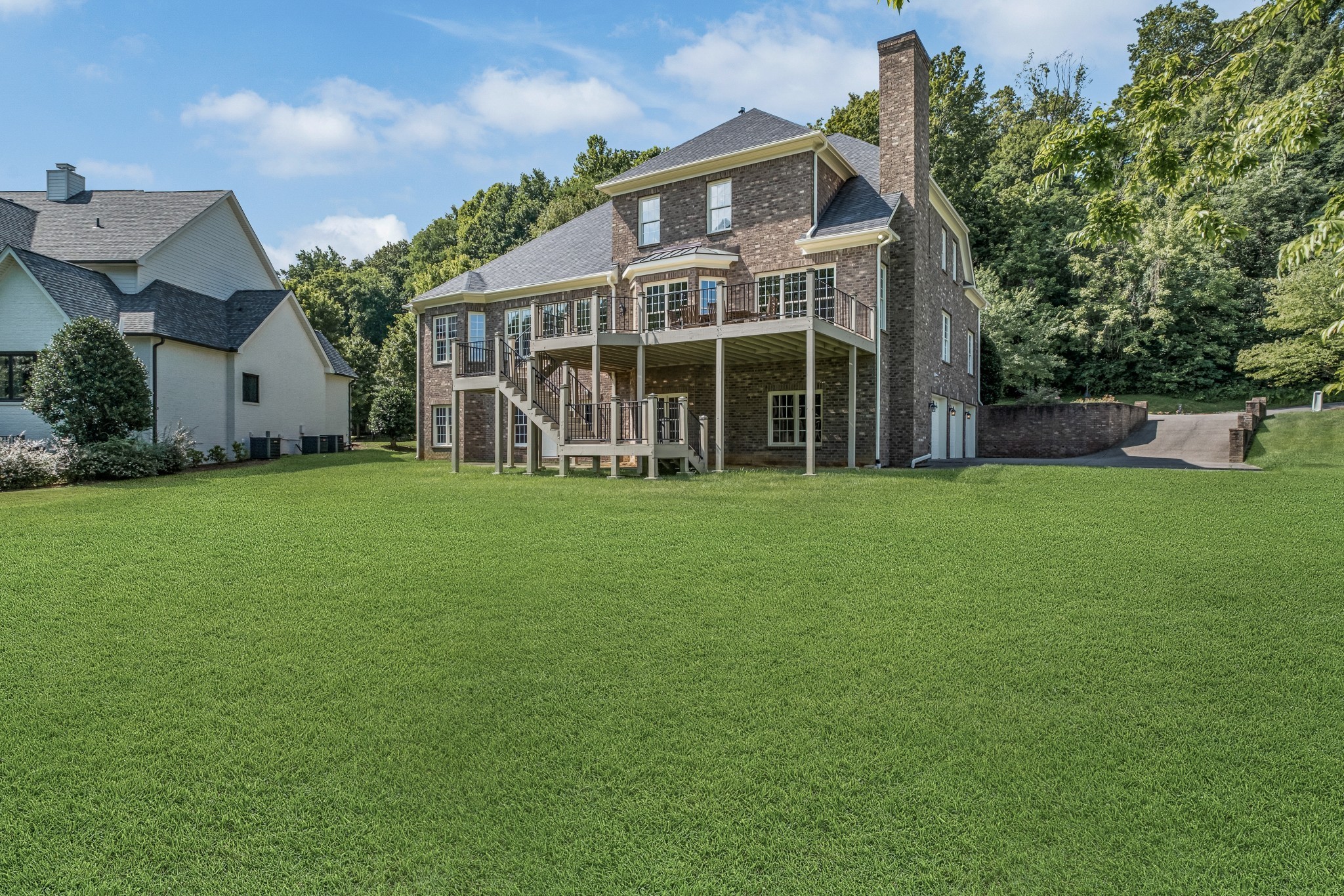 424 Sandcastle Road Franklin, TN 37069 - Photo 60 of 62 a view of a house with a yard and sitting area