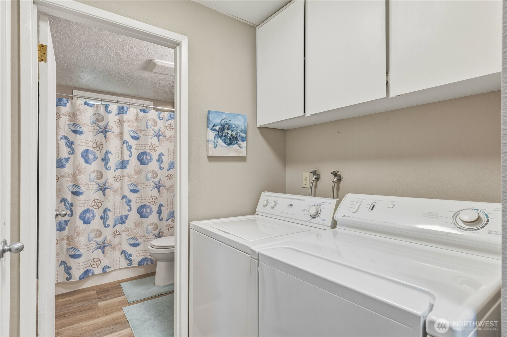 369 East Birnie Slough Road Cathlamet, WA 98612 - Photo 18 of 31 a utility room with dryer and washer