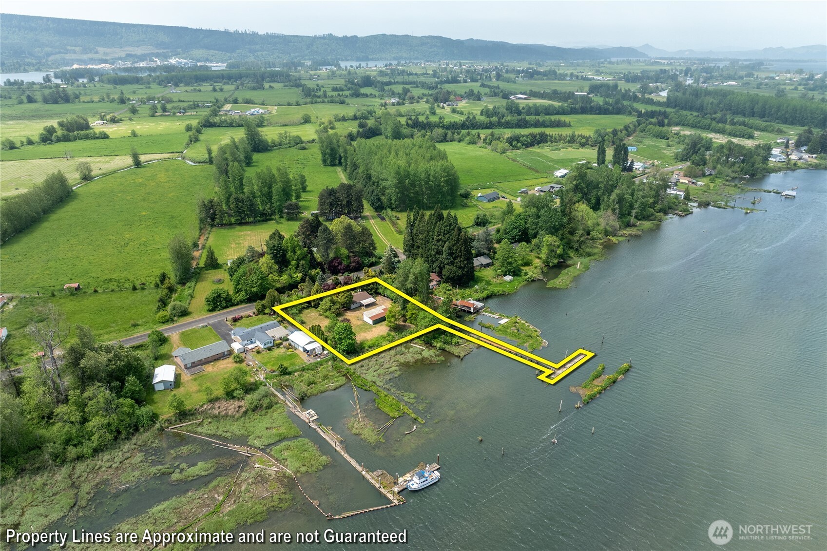 369 East Birnie Slough Road Cathlamet, WA 98612 - Photo 4 of 31 a view of lake with mountain view