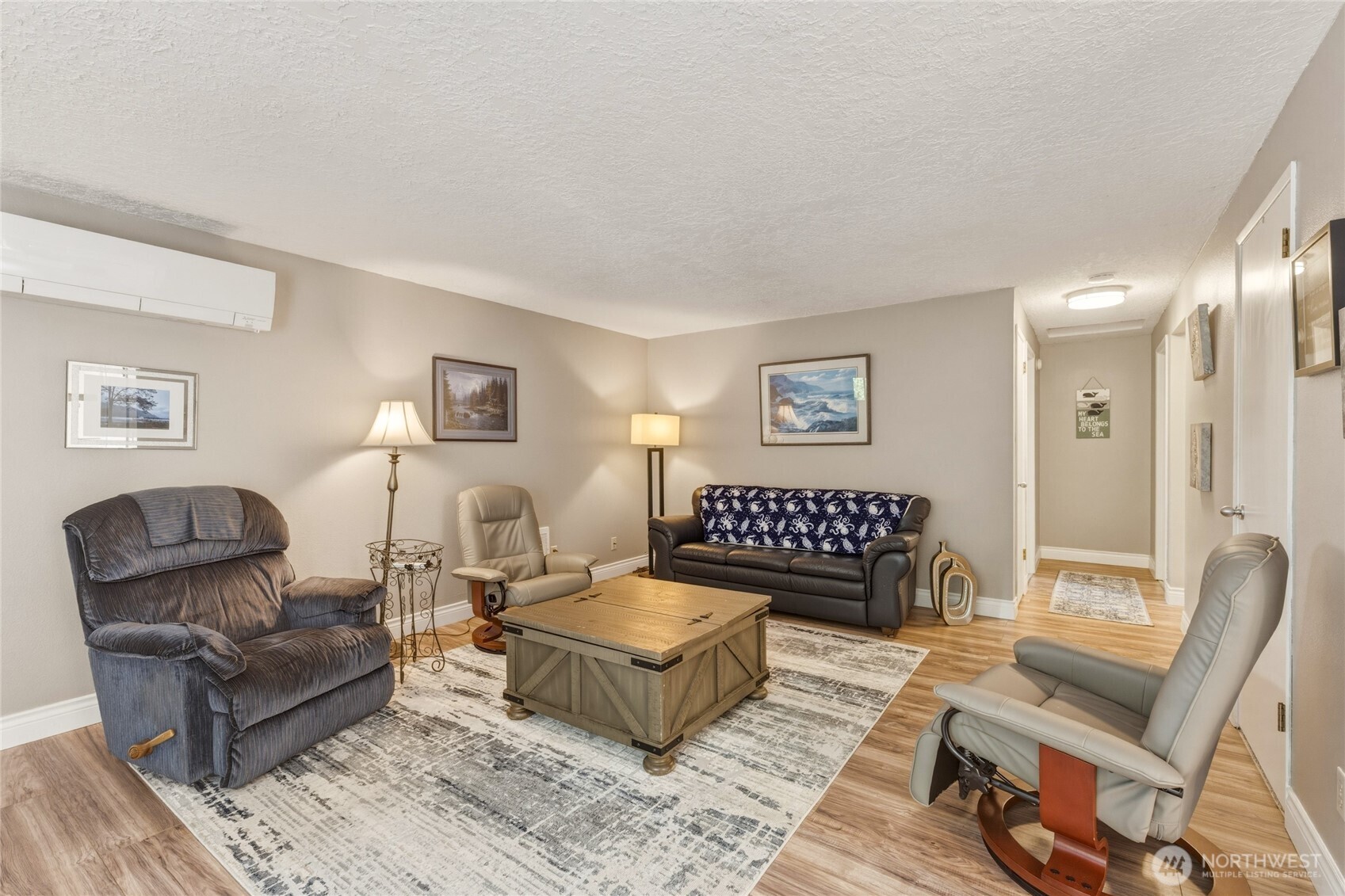 369 East Birnie Slough Road Cathlamet, WA 98612 - Photo 8 of 31 a living room with furniture and a wooden floor