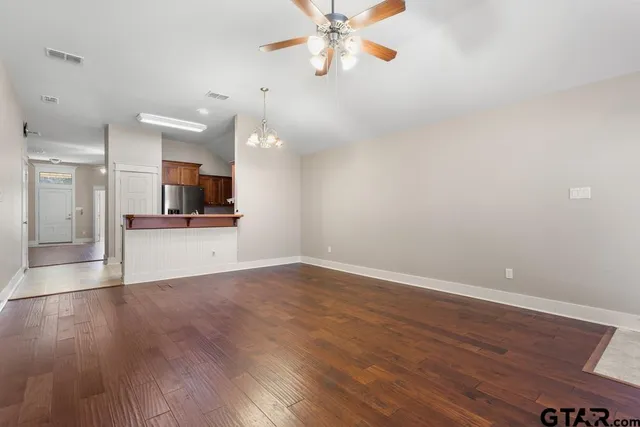 a view of a kitchen with a sink and a microwave