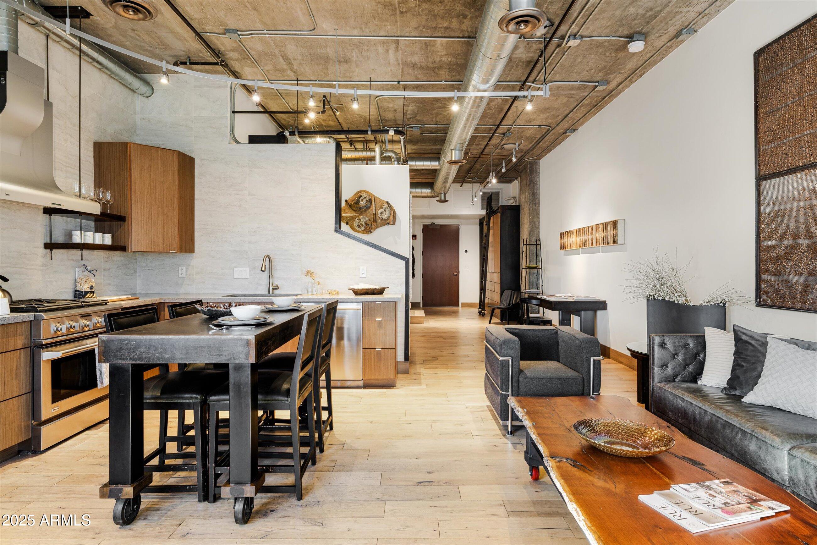 21 East 6th Street, Unit 507 Tempe, AZ 85281 - Photo 15 of 35 a view of a dining room with furniture