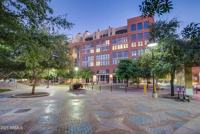 a view of a building with a street