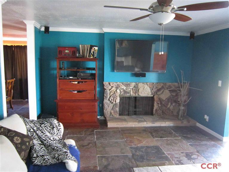 3901 Rigel Avenue Lompoc, CA 93436 - Photo 12 of 17 a living room with furniture and a rug