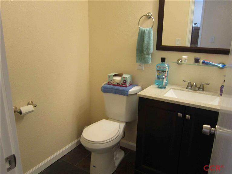 3901 Rigel Avenue Lompoc, CA 93436 - Photo 15 of 17 a bathroom with a sink and a toilet