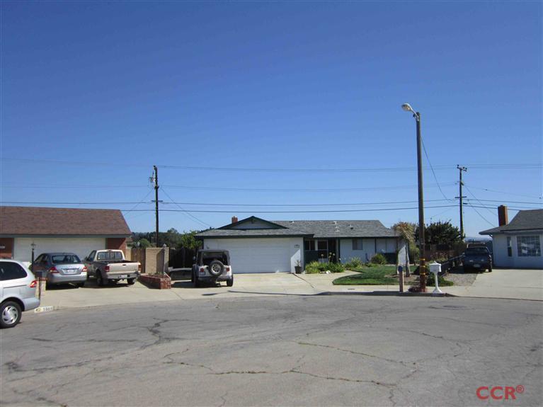 3901 Rigel Avenue Lompoc, CA 93436 - Photo 2 of 17 a view of a street and car parked