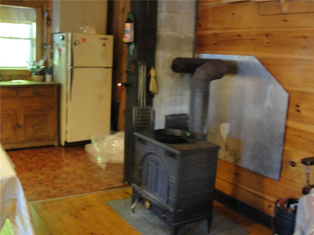 219 Win Brown Road Stoneham, ME 04231 - Photo 22 of 42 Wood stove for chilly nights.