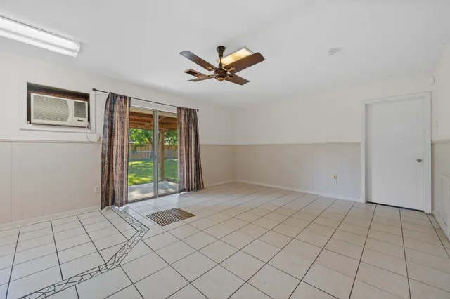 a view of an empty room and window