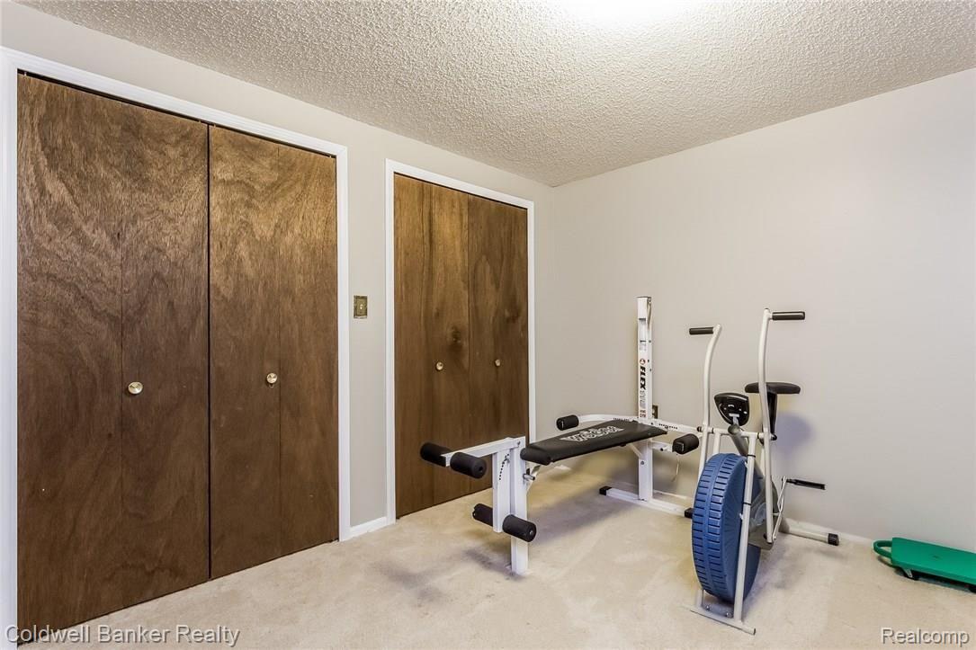 2104 Bone Road Holly, MI 48442 - Photo 26 of 38 041-Exercise_Room-2280290-medium.jpg