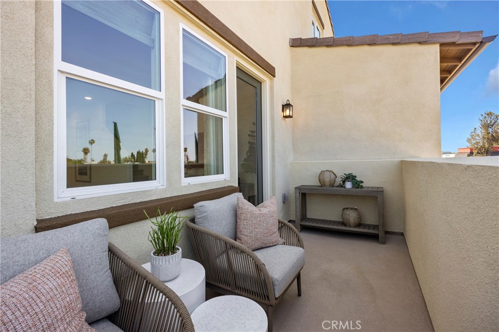1950 West Sycamore Drive Compton, CA 90220 - Photo 18 of 23 a living room with furniture and a potted plant