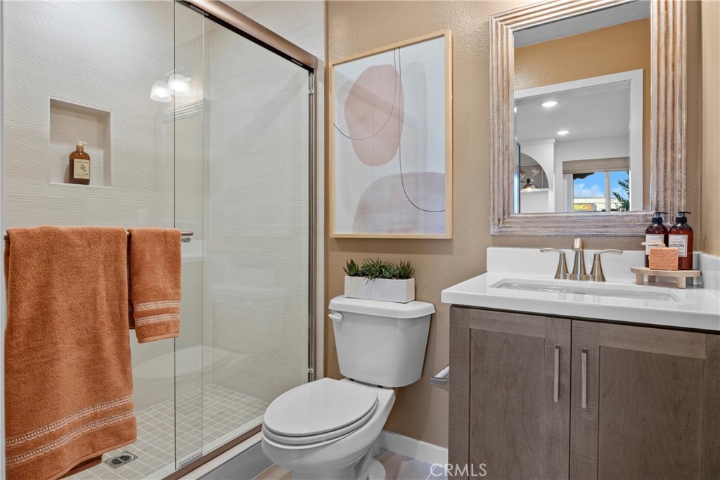 1950 West Sycamore Drive Compton, CA 90220 - Photo 8 of 23 a bathroom with a granite countertop sink toilet and shower
