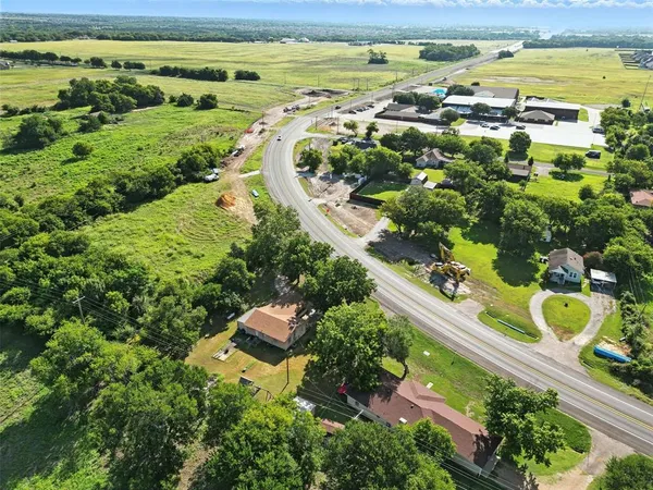 a aerial view of a house with a ocean view