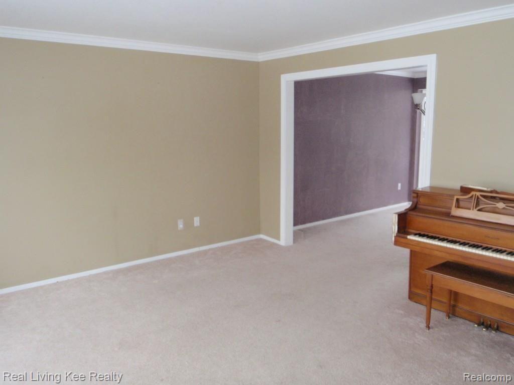 417 Bolinger Street Rochester, MI 48307 - Photo 9 of 20 Living Room to Dining Room