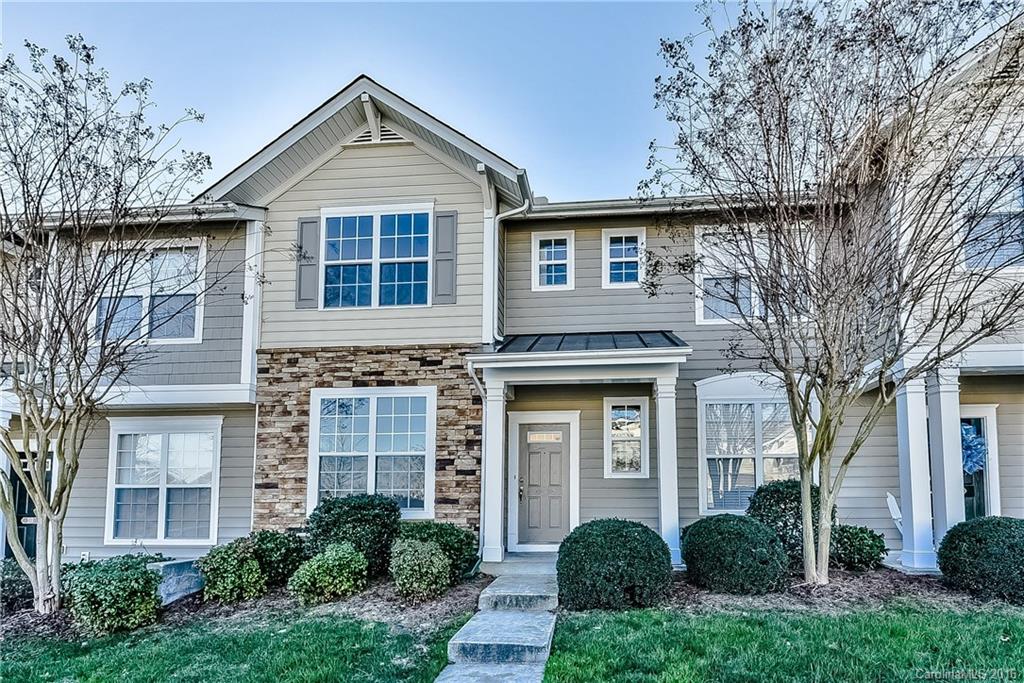 316 Sugar Ridge Court, Unit 95 Fort Mill, SC 29708 - Photo 1 of 23 a front view of a house with garden