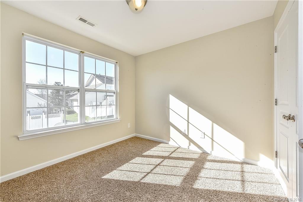316 Sugar Ridge Court, Unit 95 Fort Mill, SC 29708 - Photo 20 of 23 a view of an empty room and window