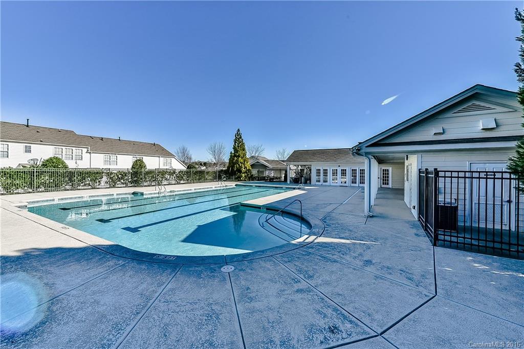 316 Sugar Ridge Court, Unit 95 Fort Mill, SC 29708 - Photo 21 of 23 a view of a house with swimming pool